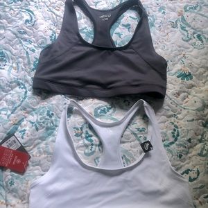 Grey and white women’s training bra’s.